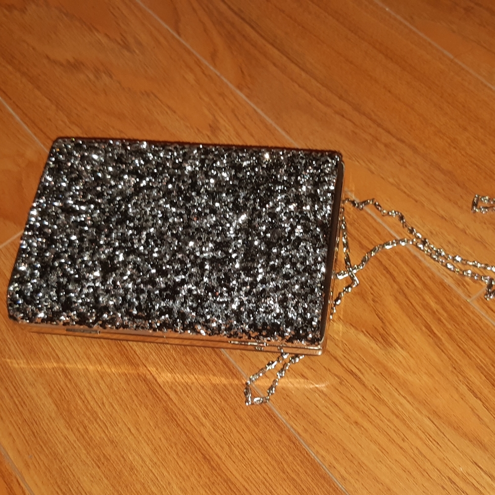 Silver and black clutch